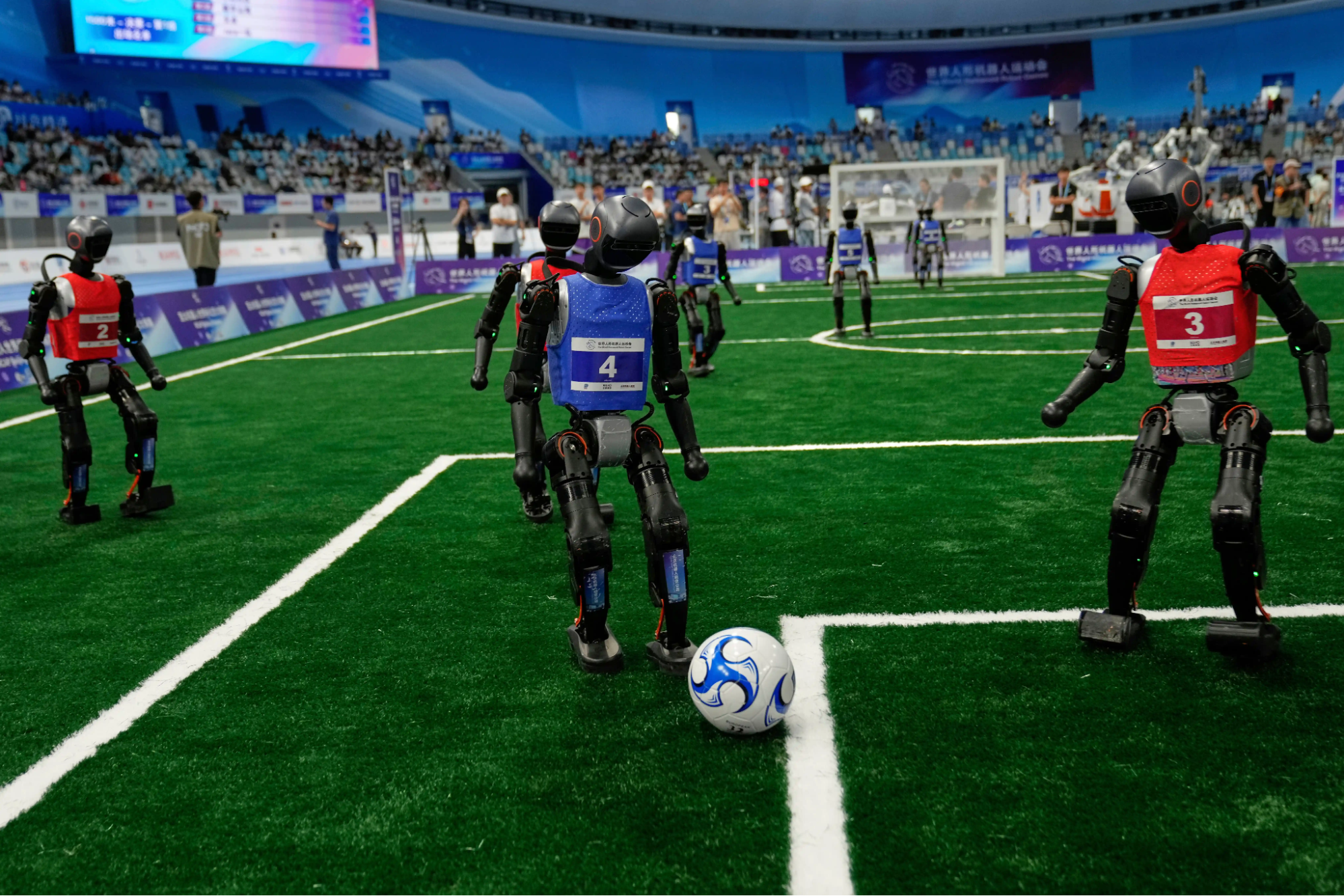 Robots playing soccer